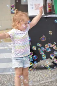 Happy child enjoying a playful moment.