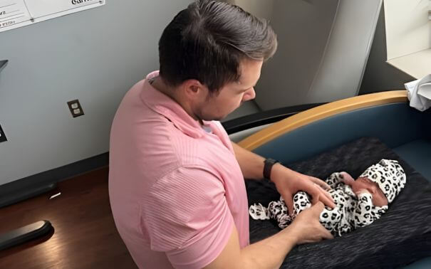 chiropractor performing a gentle adjustment