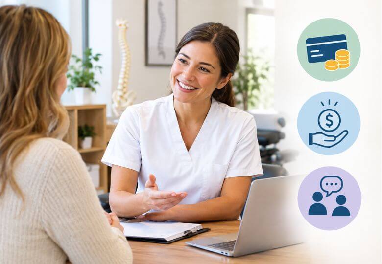 Chiropractor discussing payment options with a patient